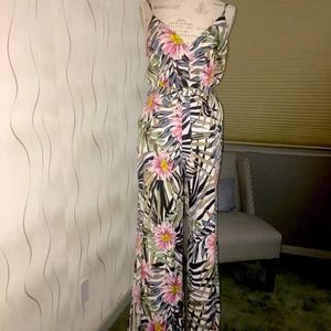 Floral jumpsuit openings on side of legs